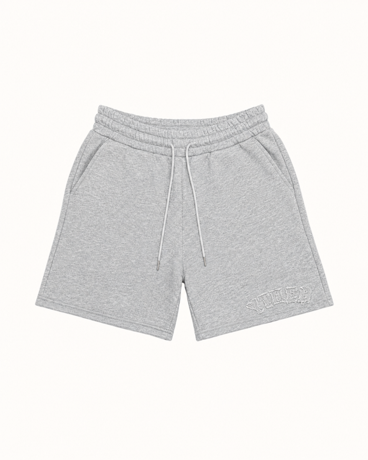 Light gray heathered sweat shorts with a white drawstring and a tonal embroidered logo on the lower left leg, displayed flat against a solid off-white background.